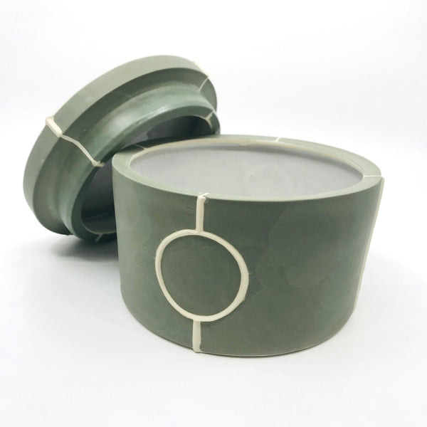 Round lidded box of slip-cast porcelain