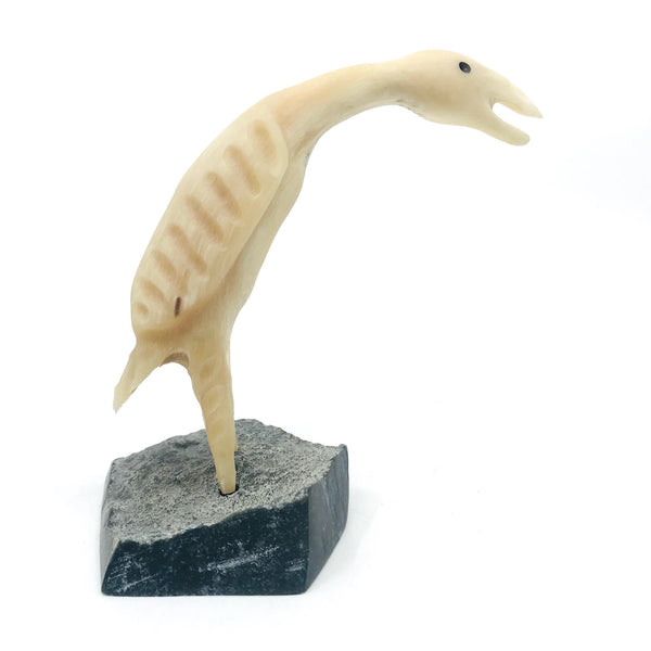Bird, muskox horn carving by David Kungatoon