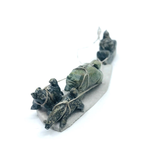 Dog Team, stone carving by Iziasie Kopalie