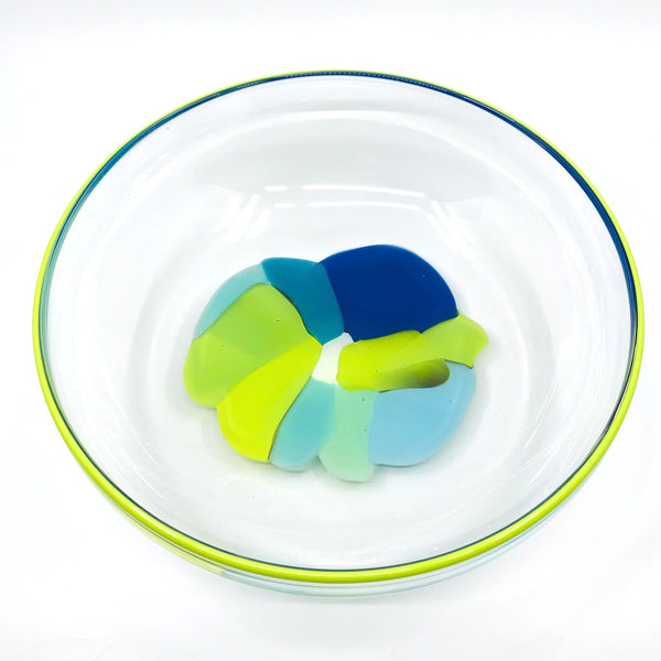 Storm Bowl of hand blown glass. One of a kind bowl in cool tones of blue and green. 25.5 x 25.5 x 9 cm.