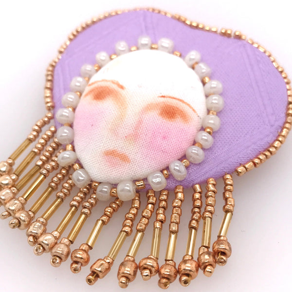 Embroidered Brooch in Purple and Gold by Charlotte Sigurdson