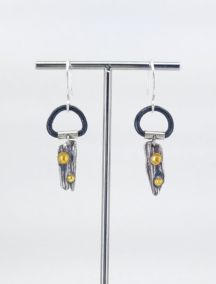 “Forest Floor” Earrings - Sterling silver ring with 23k gold leaf, copper, patina, and Greek leather.
