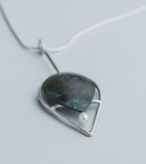 “Leaf Line” Pendant - Sterling silver necklace with a copper pendant, coloured with a cupric nitrate patina and dotted with a freshwater pearl.
