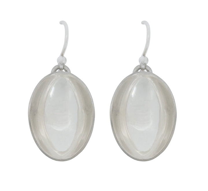 Light drop earrings in vertical. These bright concave forms are made from silver.