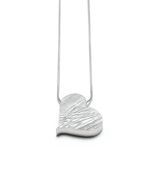 Heart pendant in sterling silver that is patterned on one side and smooth on the other. 16 x 16mm on an 18" chain. 