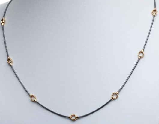 Collier Kabis: Necklace of oxidized sterling silver chain with gold plated forms. The alternating black and gold creates a strong and elegant contrast. The length is 18", or 45.7cm. 