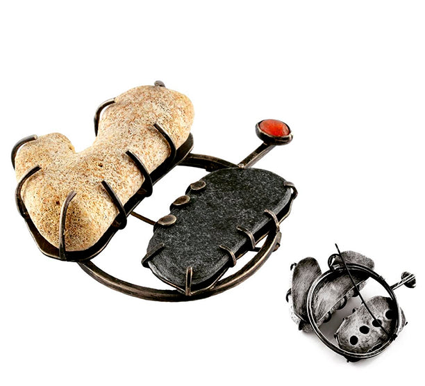 Front and back of brooch with natural elements