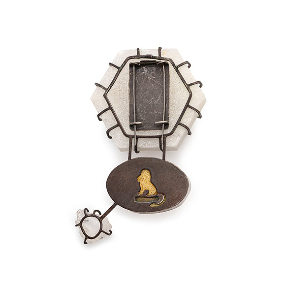 Decorative brooch with geometric design on the back