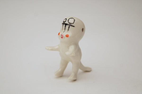 Baby T-Rex, 2023.  This hand fabricated pendant is made of ceramic, underglaze and clear glaze, china paint, and recycled silver.