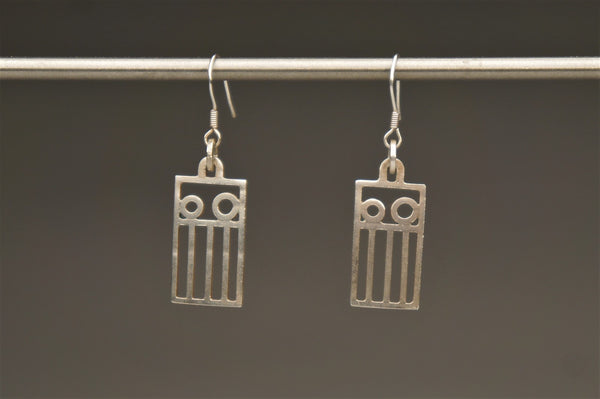 Rectangular Trashland Logo, 2022.  These hand fabricated earrings are made of sterling silver and recycled silver.  4.2 x 1.2 x 0.1 cm