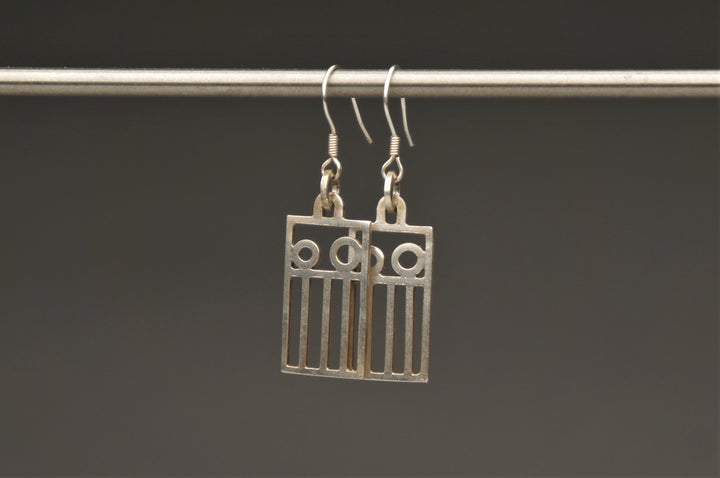 Rectangular Trashland Logo, 2022.  These hand fabricated earrings are made of sterling silver and recycled silver.  4.2 x 1.2 x 0.1 cm