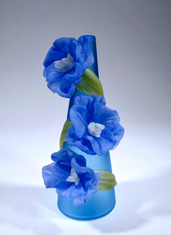 Medium Sprig Vase, with blue gardinia. Hand blown and solid worked decorative glass vessel, with sandblasted surface.