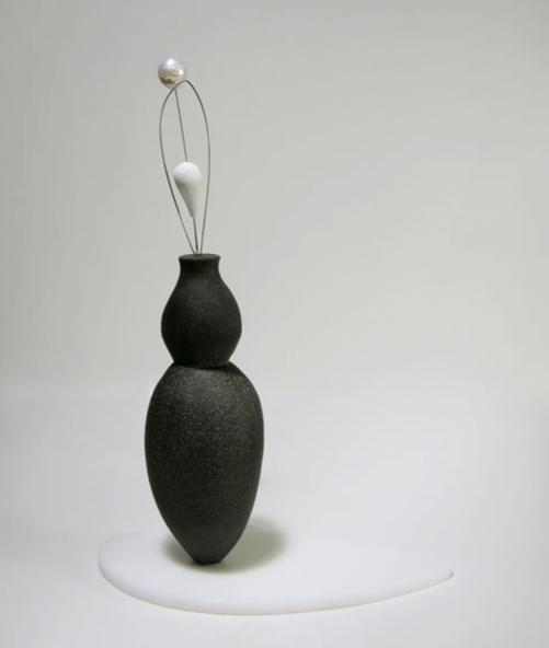 Standing vessel, small tabletop sculpture by Vivienne Jones