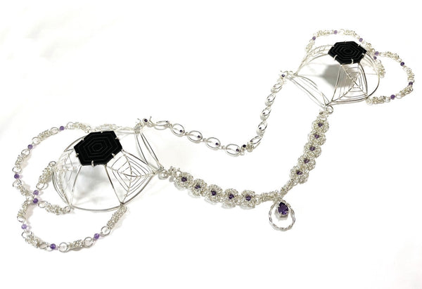 Murky Warrior (玄武), 2023.  This hand fabricated set with pauldrons--which can be separated into a neckpiece,  brooches, and earrings--is made from sterling silver, amethyst, amethyst beads, and acrylic. Every part is detachable and can be worn separately.  19cm × 20cm × 12cm