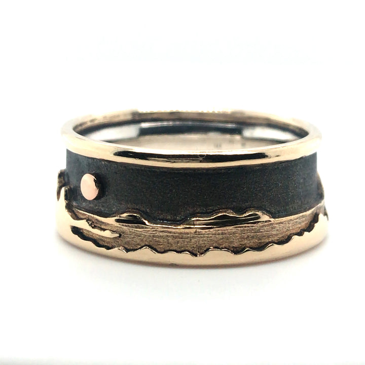 Landscape at night ring with a soft black sky showing beautifully the layers of detail in 14K gold