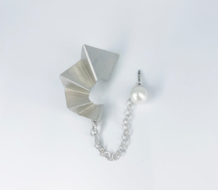 Ladder of human progress brooch with pearl, 2022.  Hand fabricated sterling silver brooch with a 7.5mm white pearl.  3.9cm × 2.6cm × 1cm