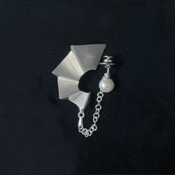 Ladder of human progress brooch with pearl, 2022.  Hand fabricated sterling silver brooch with a 7.5mm white pearl.  3.9cm × 2.6cm × 1cm