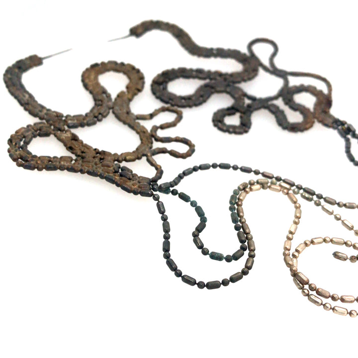 Large and light snake-like earrings of repurposed bamboo chain, with silver plating. 