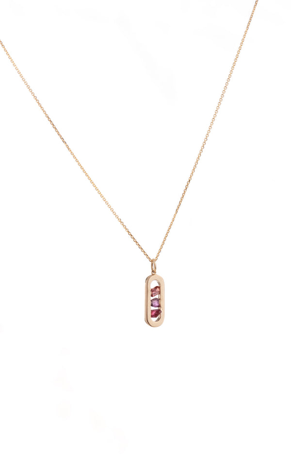 14k yellow gold pendant gorgeously studded with three rough sapphires in different tones of pink (0.23ct total).
