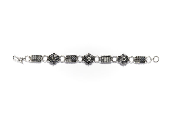 Fraisier Bracelet: From the Nos Jardins series, stud drop earrings in sterling silver with black and grey concrete.