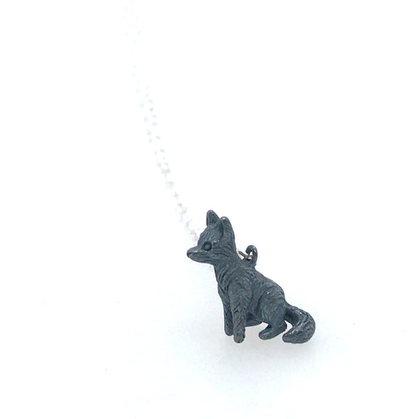 Seated Black Dog Silver Pendant by Melody Juthamongkol