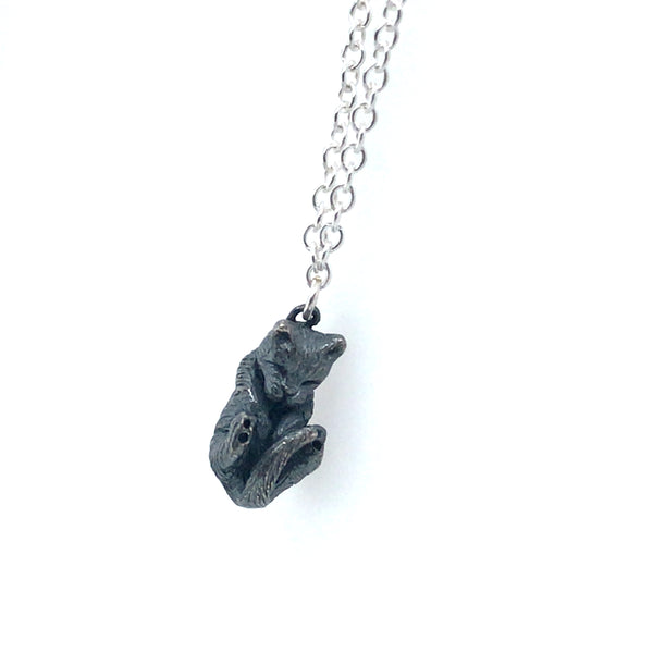 Curled Black Cat Silver Pendant by Melody Juthamongkol