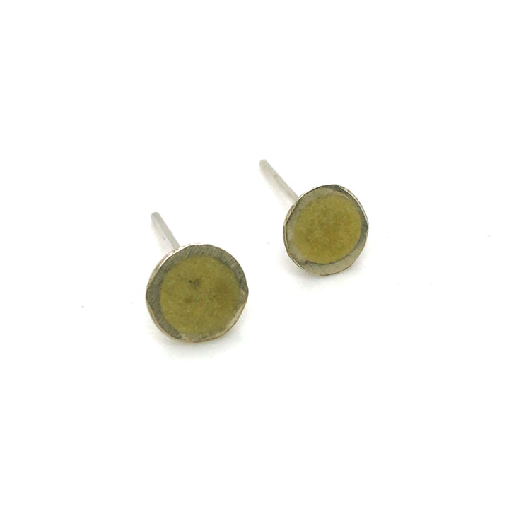 Yellow resin studs in sterling silver and enamel.