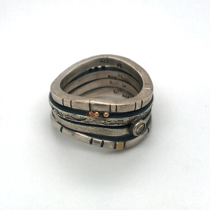 Stacked Ring - sterling silver band with 14k gold detail and embellished with a 11pt champaign diamond.