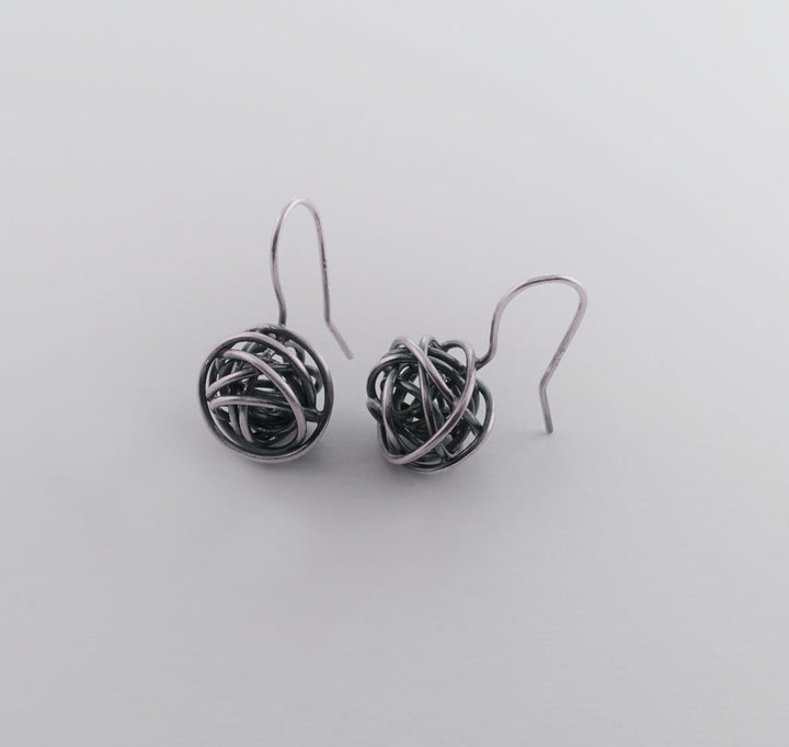 Oxidized sterling silver 'bundle' earrings. 4 cm total length x 1.5cm wide.