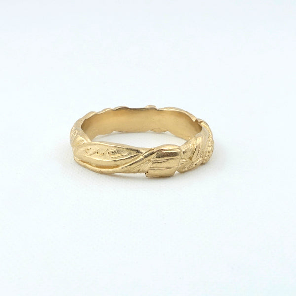 Garland ring: 14k yellow gold. The 4mm band is fully surrounded in rich textures.