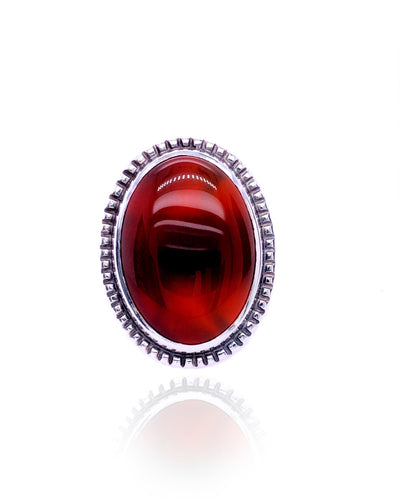 Large Carnelian set in a Ribbed Ring.  