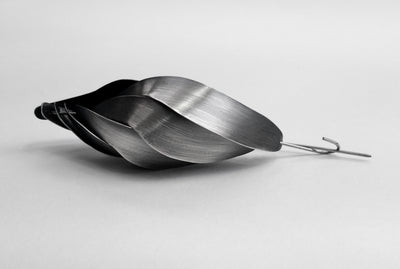 Silver Reimagining Blombos brooch, 2021. Sterling silver, stainless steel - hand-formed and constructed, patinated, hand finished.