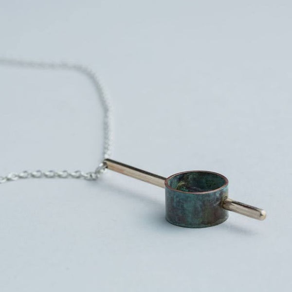 “Industrial Line” Pendant - Geometric brass and patinated copper pendant on a 17" chain.