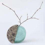 Stone and Glass Vase   This piece features concrete and recycled plate glass. 4 x 3.5 x 1"