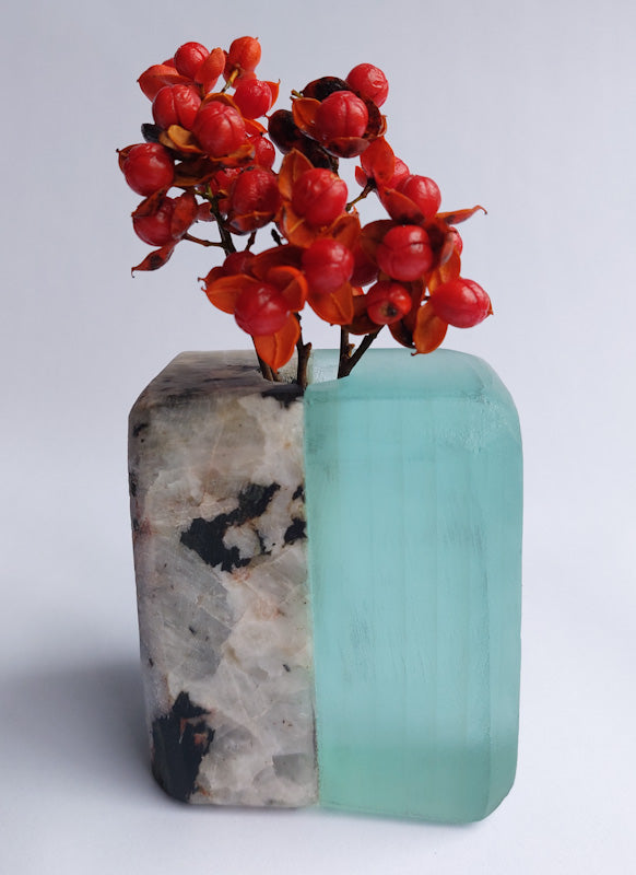 Stone and Glass Vase   Fused rock and recycled plate glass.  3 w x 3.25 h x 2.25 d inches