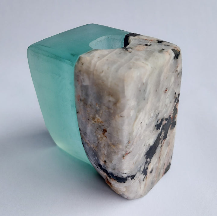 Stone and Glass Vase   Fused rock and recycled plate glass.  3 w x 3.25 h x 2.25 d inches