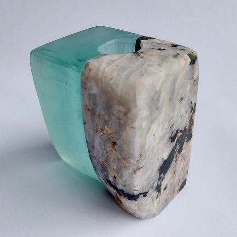 Stone and Glass Vase   Fused rock and recycled plate glass.  3 w x 3.25 h x 2.25 d inches