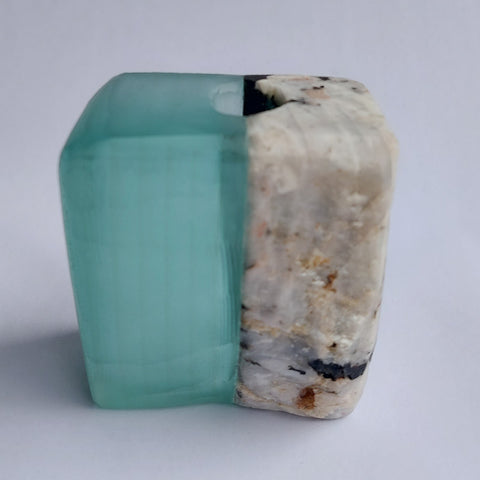 Stone and Glass Vase   Fused rock and recycled plate glass.  3 w x 3.25 h x 2.25 d inches