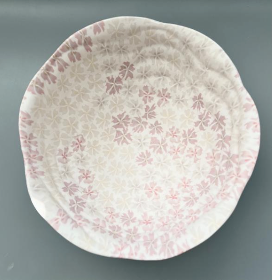 Large ceramic floral bowl in red, made with the nerikomi ceramic technique. 