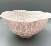 Large ceramic floral bowl in red, made with the nerikomi ceramic technique. 