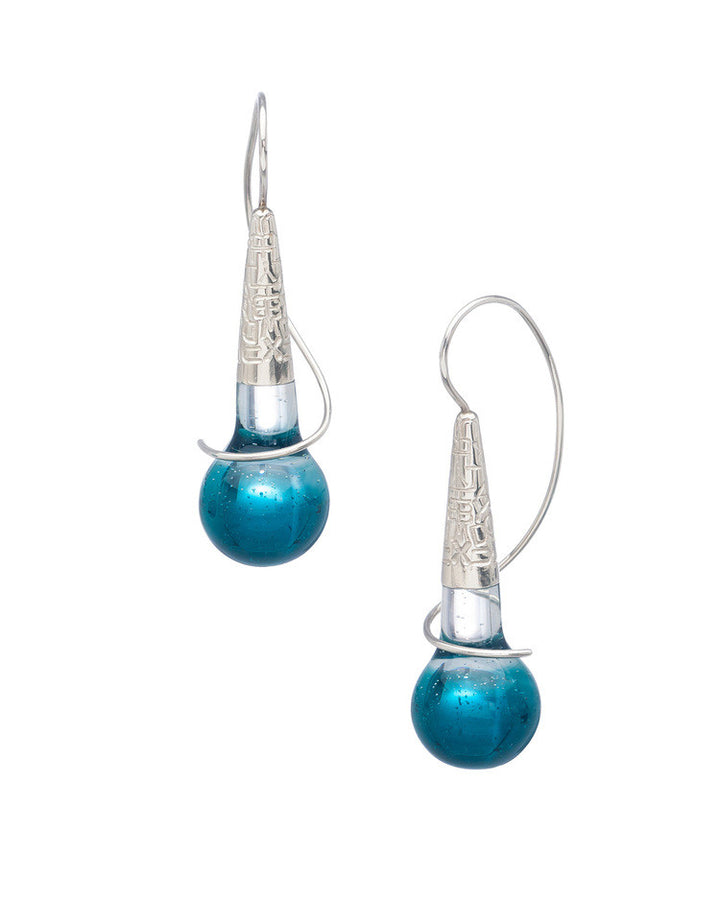 Tone earrings made with resin and sterling silver.    This piece is part of the Resonance collection, a language-inspired interplay of light and colour between lustrous surfaces and vibrant transparency.  Sold individually and colours may vary from images shown.