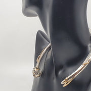 This statement collar is hollow formed in sterling silver, 14k and 18k gold. 12 x 13 x 2 cm