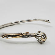 This statement collar is hollow formed in sterling silver, 14k and 18k gold. 12 x 13 x 2 cm