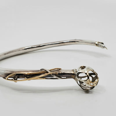 This statement collar is hollow formed in sterling silver, 14k and 18k gold. 12 x 13 x 2 cm