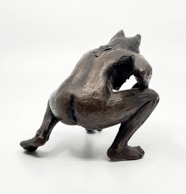 Anna Williams She Wolves series. She Wolf crouching with one hand on the ground. Individual cast bronze sculpture. Approx. 7" x 4" x 3".