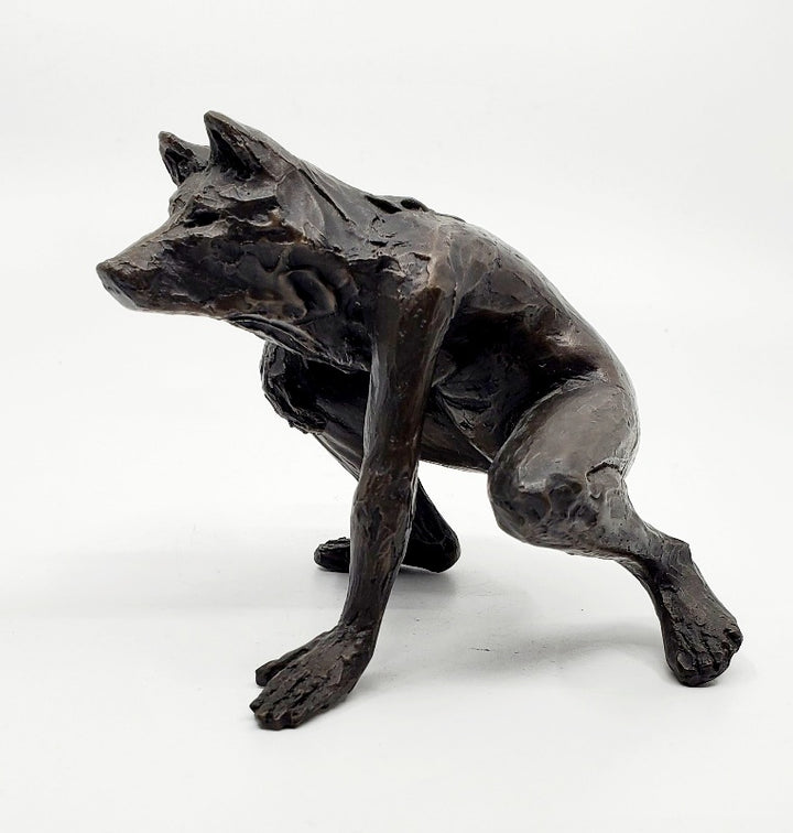 Anna Williams She Wolves series. She Wolf crouching with one hand on the ground. Individual cast bronze sculpture. Approx. 7" x 4" x 3".