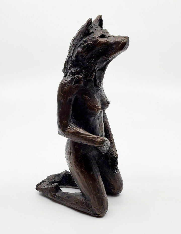 Anna Williams She Wolves series. She Wolf kneeling with one hand touching her belly. Individual cast bronze sculpture. Approx. 7" x 4" x 3".