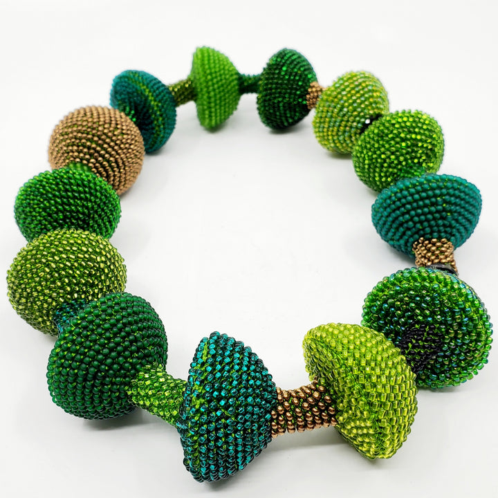 Yael Krakowski Green Mushroom with glass beads, and thread.