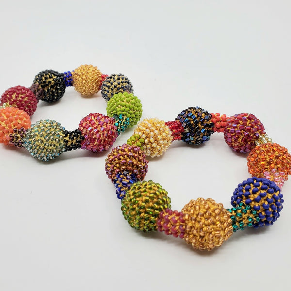 Yael Krakowski Multicoloured Small Ball Bracelet with glass beads and thread.