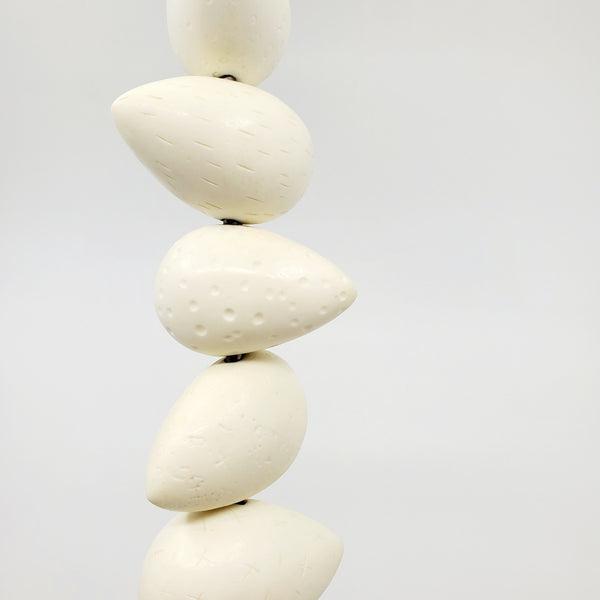 "Still form 1" - White resin forms on a steel and concrete base.  Measures approx. 57 cm in height and 14 cm in diameter.